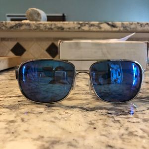 Costa Del Mar sunglasses. Polarized. Blue lenses.